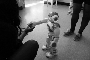Photo 3: The robot NAO, developed by Softbank Robotics, is an interactive and personalized robot already tested for educational and therapeutic purposes. Source: Glenda Hannibal