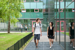 Students strolling through the Campus of the University of Vienna